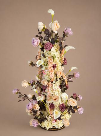 Custom floral column in blush, mauve and cream with roses, calla lilies and hydrangea