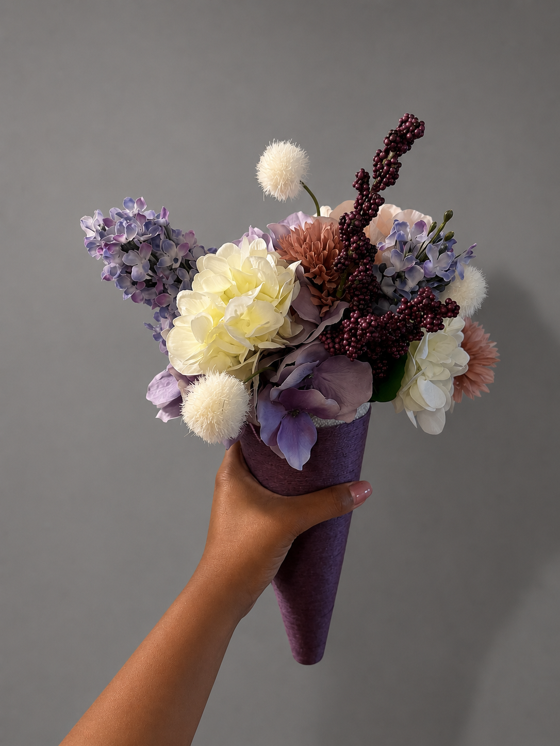 Custom bridal party bouquet in a plum cone with lavender hydrangea, ivory flowers and burgundy accents